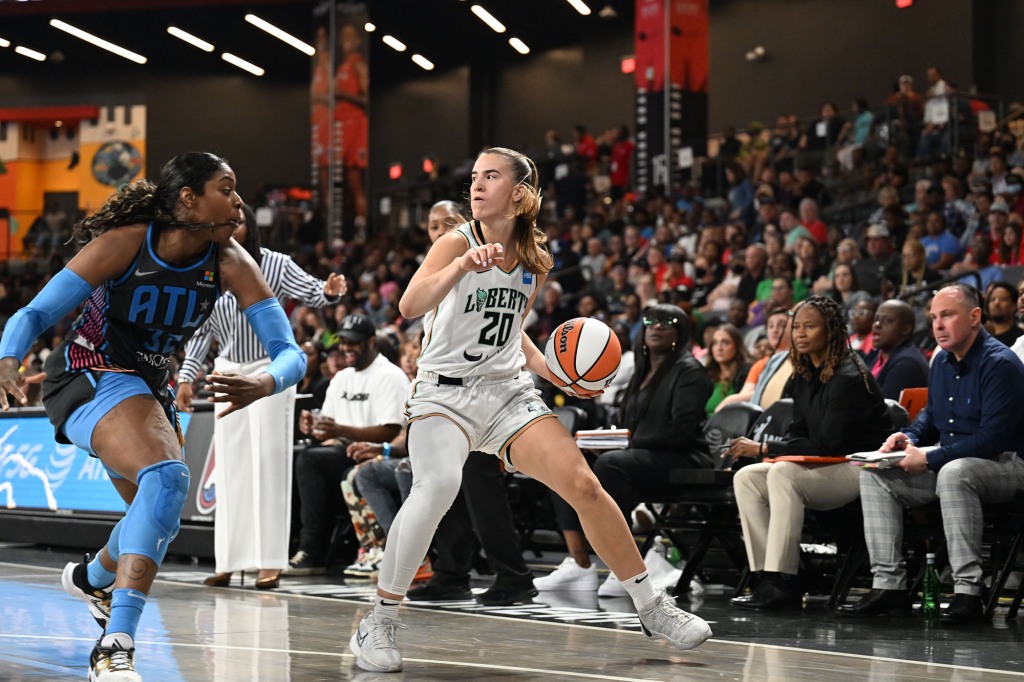 Sabrina Ionescu #20 of the New York Liberty handles the ball during the game against the Atlanta Dream on June 9, 2023 at Gateway Center Arena at College Park in Atlanta, Georgia.