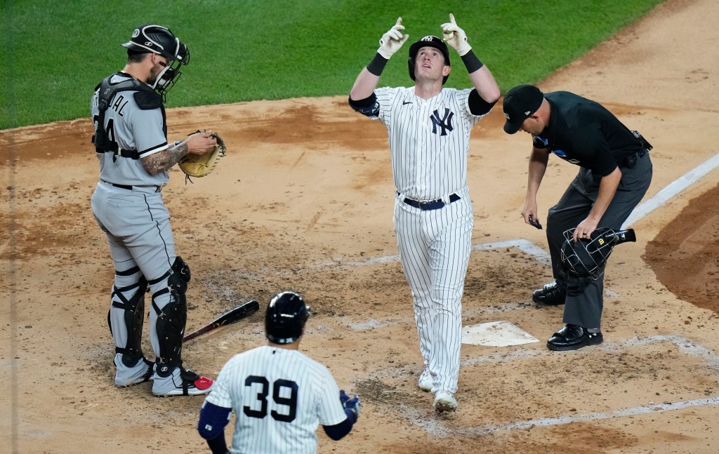 Billy McKinney looks up to the sky after rounding the bases after blasting a solo homer in the fifth inning of the Yankees' Game 2 win.