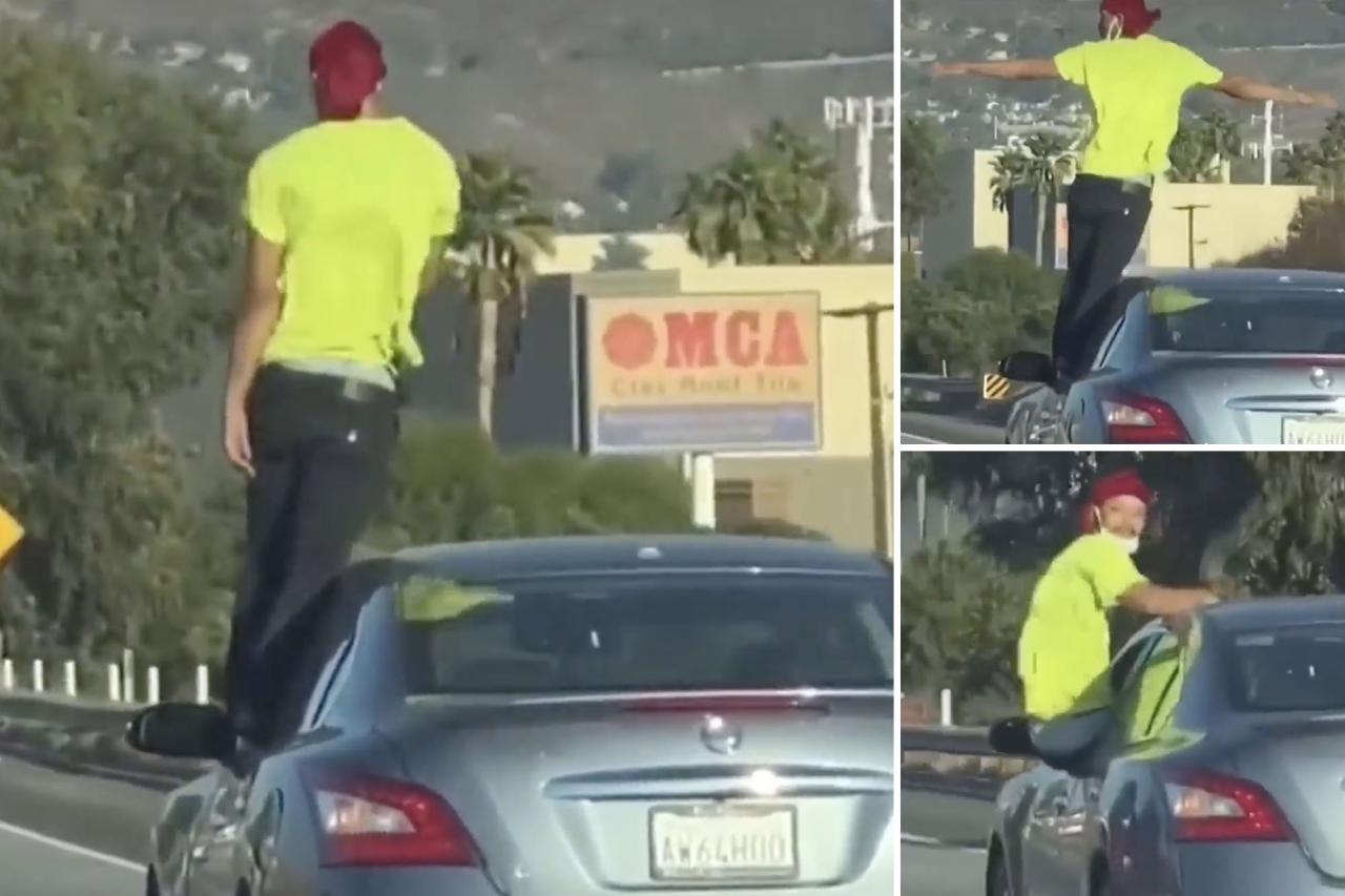 Video shows man perched onside car on California freeway