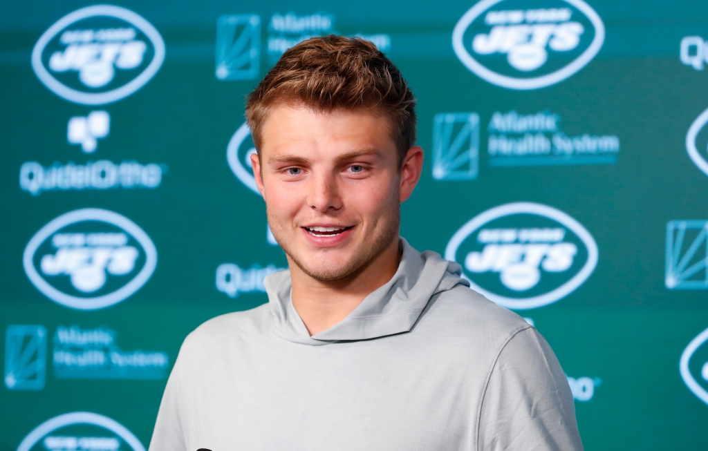 Jets quarterback Zach Wilson answers questions from reporters during New York Jets OTA